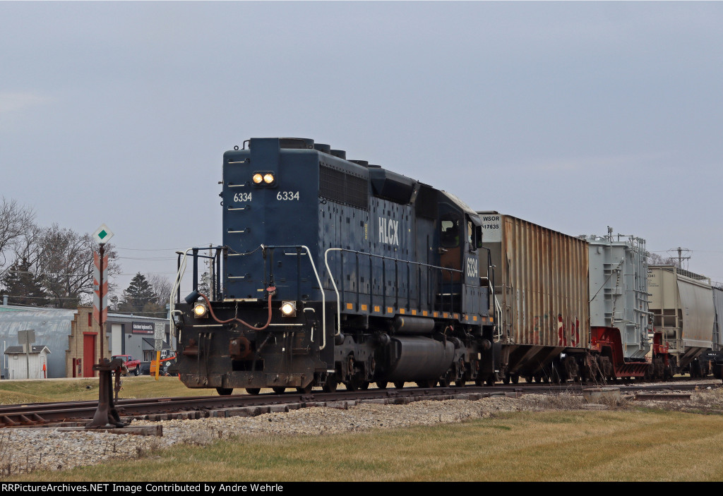 HLCX 6334 with one of many Milwaukee Road-style switch stands still extant on the Prairie Sub